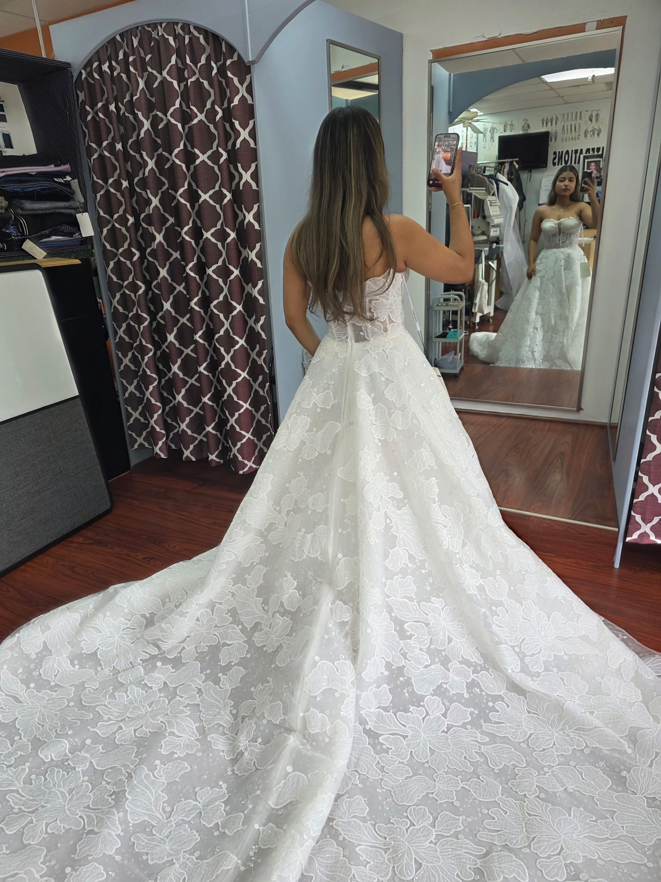 Bridal gown with floral lace detailing, fitting at GM Custom Clothier